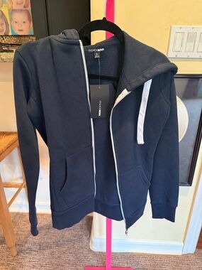 NWT navy sweat suit jogging suit jacket and pants size small. Fitted